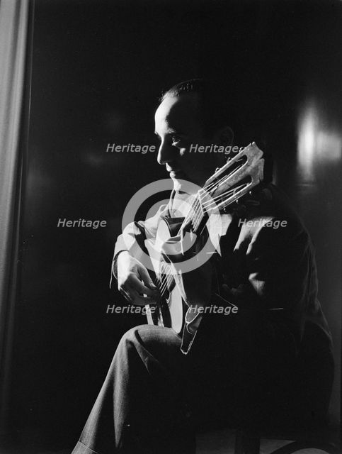 Portrait of Vincente Gomez, Café Society Uptown(?), New York, N.Y., ca. June 1946. Creator: William Paul Gottlieb.
