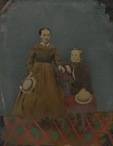 Portrait of young boy and girl, 1860s-1880s. Creator: Unknown