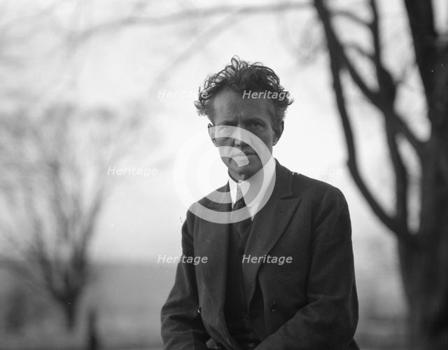 Portrait photograph of Arnold Genthe taken outdoors, between 1911 and 1942. Creator: Arnold Genthe.