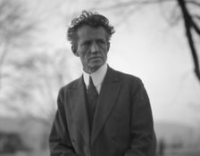 Portrait photograph of Arnold Genthe taken outdoors, between 1911 and 1942. Creator: Arnold Genthe