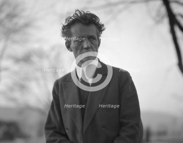 Portrait photograph of Arnold Genthe taken outdoors, between 1911 and 1942. Creator: Arnold Genthe.