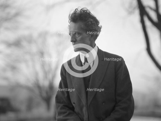 Portrait photograph of Arnold Genthe taken outdoors, between 1911 and 1942. Creator: Arnold Genthe.