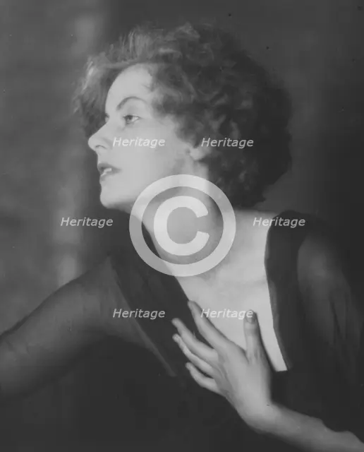 Portrait photograph of Greta Garbo, 1925 July. Creator: Arnold Genthe.