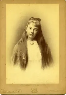 Portrait photography of an unknown teenage girl with beautiful long hair. Creator: Unknown