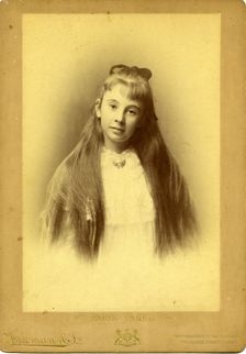 Portrait photography of an unknown teenage girl with beautiful long hair. Creator: Unknown