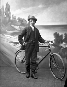 Posed man with his bicycle, Landskrona, Sweden, 1910