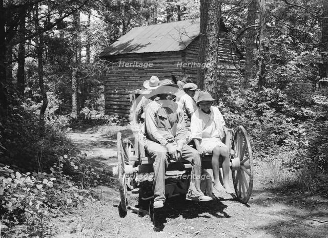 Possibly: Colored sharecropper and his children about to leave..., Shoofly, North Carolina, 1939. Creator: Dorothea Lange.
