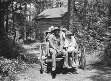 Possibly: Colored sharecropper and his children about to leave..., Shoofly, North Carolina, 1939. Creator: Dorothea Lange