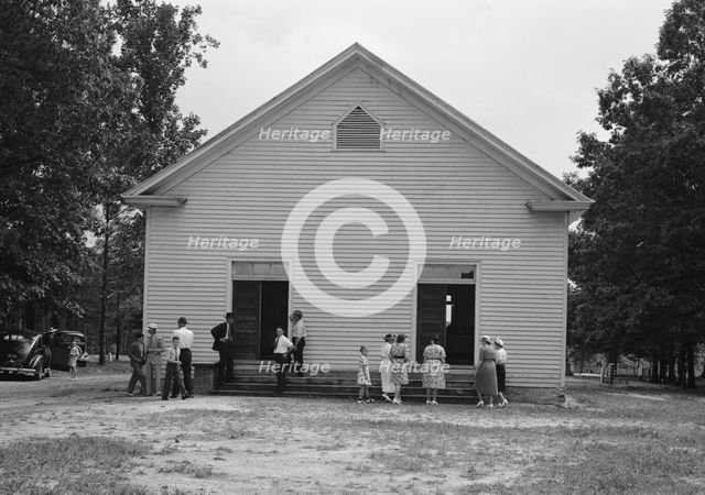 Possibly: Congregation entering church, Wheeley's Church, Person County, North Carolina, 1939. Creator: Dorothea Lange.