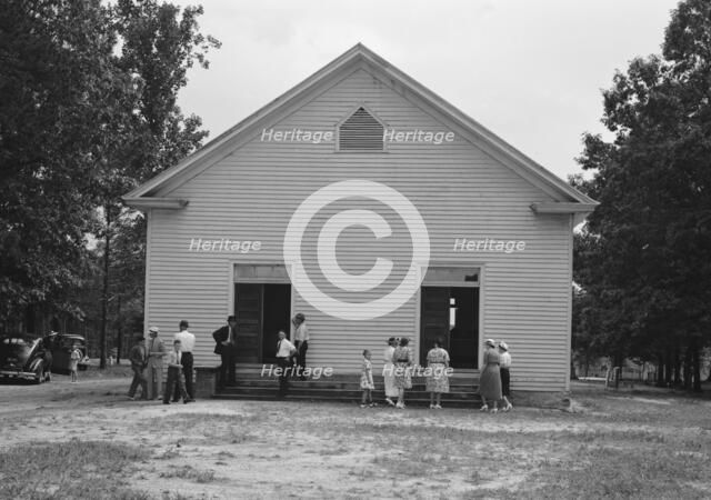 Possibly: Congregation entering church, Wheeley's Church, Person County, North Carolina, 1939. Creator: Dorothea Lange.