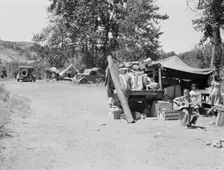 Possibly: Camp of migratory families in "Ramblers Park", Yakima Valley, Washington, 1939. Creator: Dorothea Lange