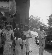 Possibly: Chatham County farmers in town on Saturday afternoon, Pittsboro, North Carolina, 1939. Creator: Dorothea Lange