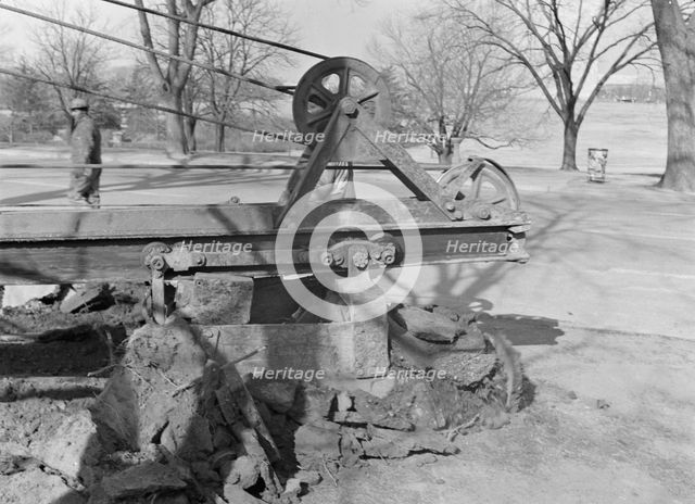 Possibly: Clearing earth and old paving for extension...at Fourteenth, Washington, D.C, 1942. Creator: Dorothea Lange.