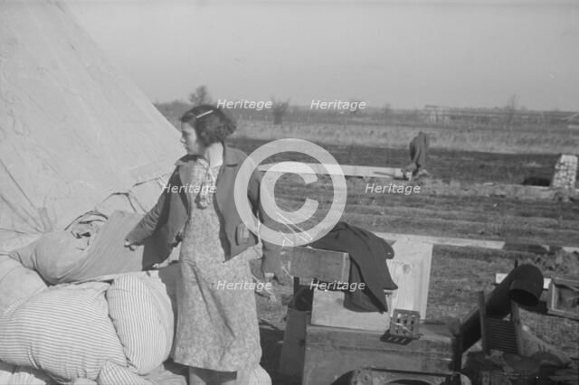 Possibly: A girl in the camp for white flood refugees, Forrest City, Arkansas, 1937. Creator: Walker Evans.