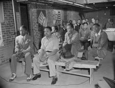 Possibly: Air raid wardens meeting in zone nine, Southwest area, Washington, D.C., 1942. Creator: Gordon Parks