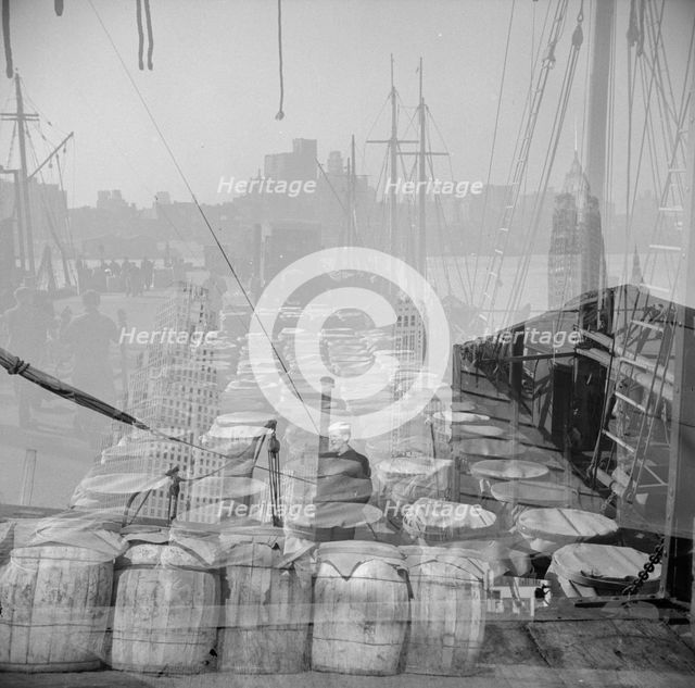 Possibly: Barrels of fish on the docks at the Fulton fish market ready to be..., New York, 1943. Creator: Gordon Parks.