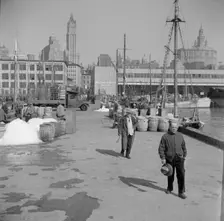 Possibly: Barrels of fish on the docks at Fulton fish market ready to be shipped..., New York, 1943. Creator: Gordon Parks