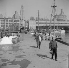 Possibly: Barrels of fish on the docks at Fulton fish market ready to be shipped..., New York, 1943. Creator: Gordon Parks