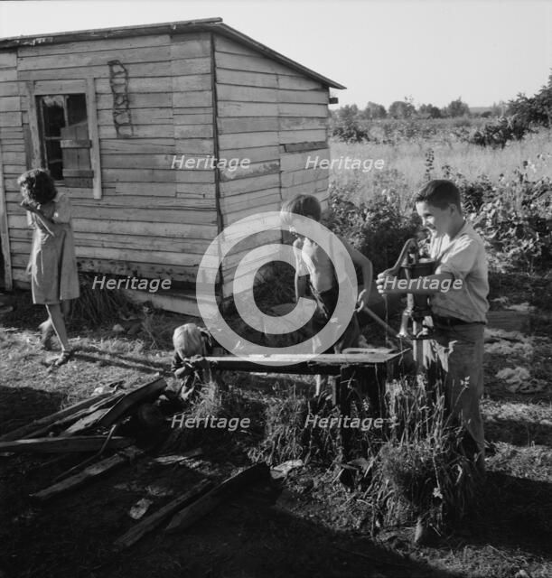 Possibly: Bean pickers' children in camp at end..., near West Stayton, Marion County, Oregon, 1939. Creator: Dorothea Lange.