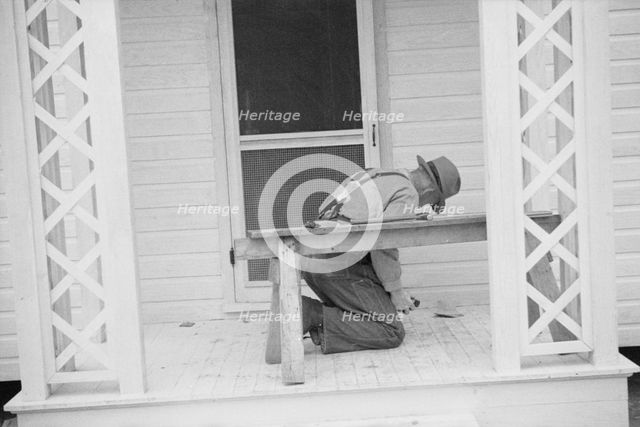 Possibly: Briar Patch Project, Carpenter at work, Eatonton, Georgia, 1936. Creator: Walker Evans.