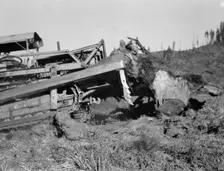 Possibly: Bulldozer raises and pushes stump on cut-over farm, Lewis County, Western Washington, 1939 Creator: Dorothea Lange