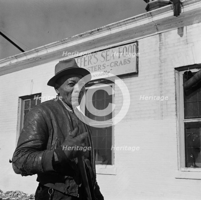 Possibly: Dock worker, Washington, D.C., 1942. Creator: Gordon Parks.