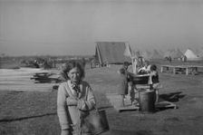 Possibly: Facilities for washing in the camp for white flood...at Forrest City, Arkansas, 1937. Creator: Walker Evans