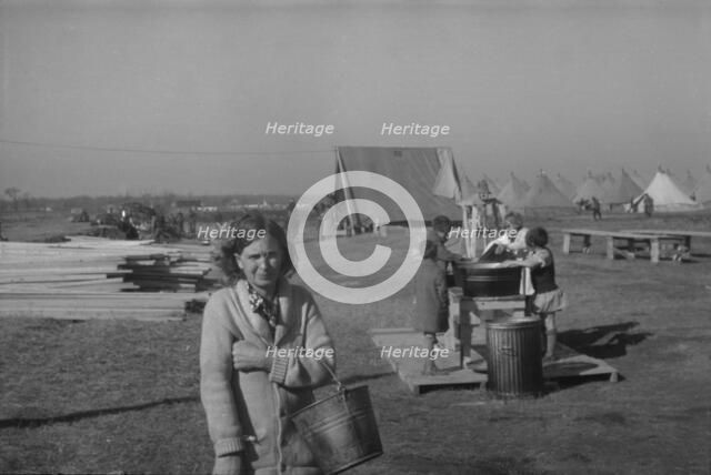 Possibly: Facilities for washing in the camp for white flood...at Forrest City, Arkansas, 1937. Creator: Walker Evans.