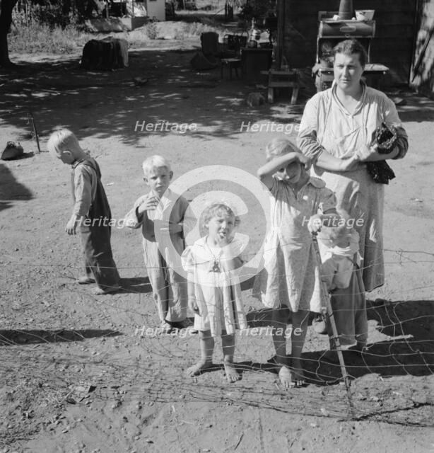 Possibly: Family living in shacktown community, mostly from..., Washington, Yakima Valley, 1939. Creator: Dorothea Lange.
