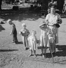 Possibly: Family living in shacktown community, mostly from..., Washington, Yakima Valley, 1939. Creator: Dorothea Lange
