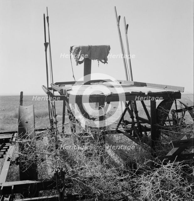 Possibly: Farm machinery left on abandoned dry land farm in Columbian Basin, Washington, 1939. Creator: Dorothea Lange.
