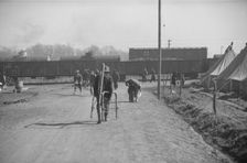 Possibly: Flood refugee encampment at Forrest City, Arkansas, ca. 1937. Creator: Walker Evans