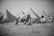 Possibly: Flood refugee encampment at Forrest City, Arkansas, ca. 1937. Creator: Walker Evans