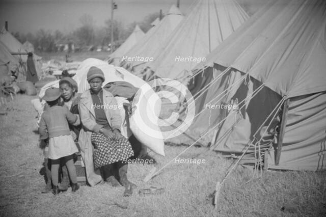 Possibly: Flood refugee encampment at Forrest City, Arkansas, ca. 1937. Creator: Walker Evans.