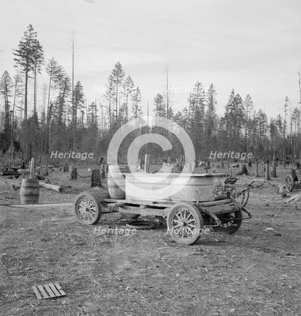 Possibly: Improved water tank on stump ranch, Boundary County, Idaho, 1939. Creator: Dorothea Lange.