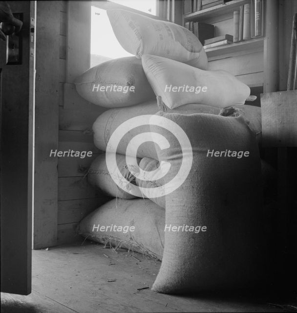 Possibly: Interior of farmer's two-room log home, FSA borrower, Boundary County, Idaho, 1939. Creator: Dorothea Lange.