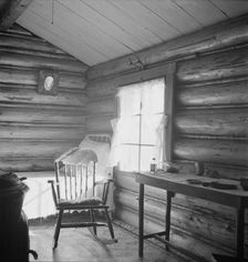 Possibly: Interior of farmer's two-room log home, FSA borrower, Boundary County, Idaho, 1939. Creator: Dorothea Lange