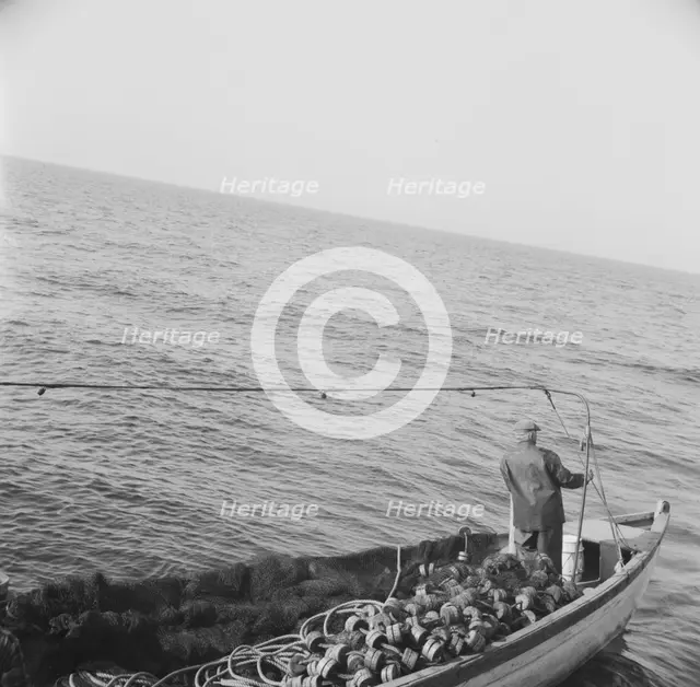 Possibly: On board the fishing boat Alden, out of Glocester, Massachusetts, 1943. Creator: Gordon Parks.