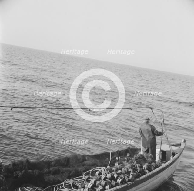 Possibly: On board the fishing boat Alden, out of Glocester, Massachusetts, 1943. Creator: Gordon Parks.