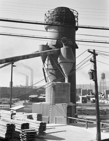 Possibly: Lumber burner and stacks of the Big Lakes Lumber Company..., Klamath Falls, Oregon, 1939. Creator: Dorothea Lange