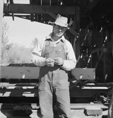 Possibly: Men working in mill, Ola self-help sawmill co-op, Gem County, Idaho, 1939. Creator: Dorothea Lange