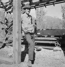 Possibly: Men working in mill, Ola self-help sawmill co-op, Gem County, Idaho, 1939. Creator: Dorothea Lange