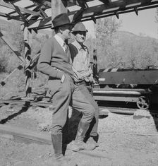 Possibly: Men working in mill, Ola self-help sawmill co-op, Gem County, Idaho, 1939. Creator: Dorothea Lange