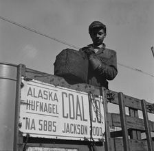 Possibly: Negro coal hauler for the Alaska Hufnagel Coal Company, Washington, D.C., 1942. Creator: Gordon Parks