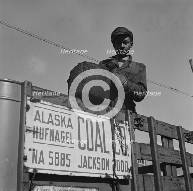 Possibly: Negro coal hauler for the Alaska Hufnagel Coal Company, Washington, D.C., 1942. Creator: Gordon Parks.