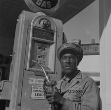 Possibly: Negro mechanic for the Amoco oil company, Washington, D.C., 1942. Creator: Gordon Parks