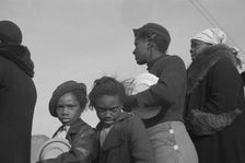 Possibly: Negroes in the lineup for food at meal time at the camp..., Forrest City, Arkansas, 1937. Creator: Walker Evans