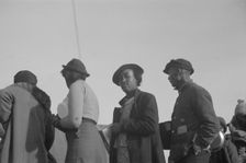 Possibly: Negroes in the lineup for food at meal time in the camp..., Forrest City, Arkansas, 1937. Creator: Walker Evans