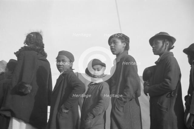 Possibly: Negroes in the lineup for food at meal time in the camp..., Forrest City, Arkansas, 1937. Creator: Walker Evans.