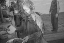 Possibly: Negroes in the lineup for food at mealtime in the camp..., Forrest City, Arkansas, 1937. Creator: Walker Evans